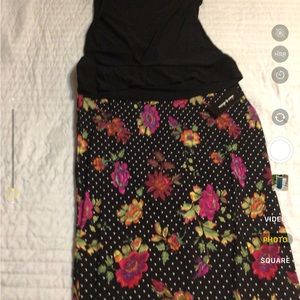 Alex &Oliva skirt floral print $8.00(large).        Black blouse (Small) $7.00